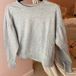 Women’s long sleeve sweatshirt.